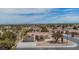 Home with a well-manicured desert landscape and mountain views in the distance at 2532 Big Timber Dr, Las Vegas, NV 89134