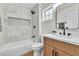 Modern bathroom with a tub and shower combo, stylish vanity, and updated fixtures at 2532 Big Timber Dr, Las Vegas, NV 89134