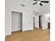 Bedroom features wood flooring, closet, and natural light from window at 2532 Big Timber Dr, Las Vegas, NV 89134
