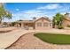 Inviting backyard with a built-in grill, covered patio, and low-maintenance landscaping at 2532 Big Timber Dr, Las Vegas, NV 89134