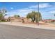 Street view of the home's exterior featuring desert landscaping and a 2 car garage at 2532 Big Timber Dr, Las Vegas, NV 89134