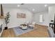 Cozy living room featuring a fireplace, modern decor, and lots of natural light at 2532 Big Timber Dr, Las Vegas, NV 89134