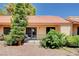 Exterior view of a home with a private patio, surrounded by mature landscaping and foliage, creating a serene backyard at 2851 S Valley View Blvd # 1039, Las Vegas, NV 89102