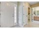 Bright foyer featuring white tile flooring and neutral paint at 2851 S Valley View Blvd # 1039, Las Vegas, NV 89102