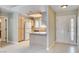 Efficient kitchen layout with breakfast bar, white appliances, and ample natural light at 2851 S Valley View Blvd # 1039, Las Vegas, NV 89102