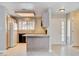 Cozy kitchen with wood cabinets, breakfast bar, and modern appliances at 2851 S Valley View Blvd # 1039, Las Vegas, NV 89102
