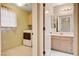 Light and bright laundry room situated near a bathroom features modern washer and dryer for convenient chores at 2851 S Valley View Blvd # 1039, Las Vegas, NV 89102