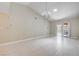Spacious living room with vaulted ceilings, tile floors, and a stylish chandelier at 2851 S Valley View Blvd # 1039, Las Vegas, NV 89102