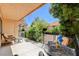 Relaxing covered patio area with charming outdoor seating and lush landscaping creates a cozy and inviting outdoor retreat at 2851 S Valley View Blvd # 1039, Las Vegas, NV 89102