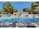 Community pool with lounge chairs, offering a refreshing and relaxing oasis on a sunny day at 2851 S Valley View Blvd # 1039, Las Vegas, NV 89102