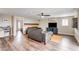 Cozy living room with comfortable seating and modern decor and wood flooring at 301 E Longacres Dr, Henderson, NV 89015