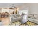 Bright living room featuring modern furnishings and an open floor plan at 301 E Longacres Dr, Henderson, NV 89015