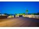 A spacious roof deck provides panoramic views of the surrounding area and landscaping at 301 E Longacres Dr, Henderson, NV 89015