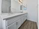 Bathroom featuring double sink vanity with modern fixtures and ample storage at 3109 W Colton Ave, North Las Vegas, NV 89032
