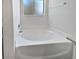 Bright bathroom highlighting the large soaking tub, window, and modern fixtures at 3109 W Colton Ave, North Las Vegas, NV 89032