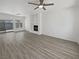 Spacious living room features neutral tones, modern flooring and a cozy fireplace at 3109 W Colton Ave, North Las Vegas, NV 89032