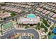 Stunning aerial view featuring community amenities including pool, bocce ball court, and community center at 3307 Forestina Ct, Las Vegas, NV 89122