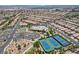 Aerial view of the community featuring swimming pool, tennis courts, and community center at 3307 Forestina Ct, Las Vegas, NV 89122