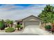 Charming single-story home with a well-manicured landscape and a two-car garage at 3307 Forestina Ct, Las Vegas, NV 89122