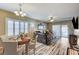 Open concept living room with a dining area and sliding glass doors at 3307 Forestina Ct, Las Vegas, NV 89122
