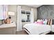 Charming bedroom with decorative wall art, bright pillows, and soft window lighting at 344 Tigullio Ave, Henderson, NV 89011