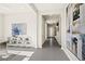 Open hallway featuring sleek flooring, minimalist decor, and a bright, airy atmosphere at 344 Tigullio Ave, Henderson, NV 89011