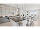 Open concept kitchen with a large island and bar seating at 344 Tigullio Ave, Henderson, NV 89011