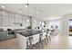 Open concept kitchen with a large island and bar seating at 344 Tigullio Ave, Henderson, NV 89011
