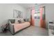 Inviting bedroom featuring a daybed, soft colors, and ample natural light from the window at 3782 Neblina Dr, Henderson, NV 89052