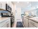 Beautiful kitchen featuring stainless steel appliances and a breakfast bar at 3782 Neblina Dr, Henderson, NV 89052