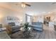 Bright living room featuring modern decor, plush sofas, and an open floor plan at 3782 Neblina Dr, Henderson, NV 89052