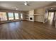 Spacious living room featuring wood floors, a fireplace, recessed lighting, and large windows at 379 Marlin Cove Rd, Henderson, NV 89012
