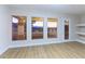 Living area with mountain views from the large windows and access to outdoor space at 379 Marlin Cove Rd, Henderson, NV 89012
