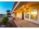 Inviting covered patio with ceiling fans, providing a comfortable outdoor space with natural light and scenic views at 379 Marlin Cove Rd, Henderson, NV 89012