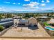 Aerial view showcases a large backyard, complete with solar panels and a sparkling pool at 3930 Maranatha Cir, Las Vegas, NV 89103