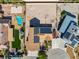 Aerial view showcases the property's pool, solar panels, and outdoor spaces at 3930 Maranatha Cir, Las Vegas, NV 89103