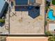 Aerial view showing backyard size, outdoor seating, pool and neighboring homes at 3930 Maranatha Cir, Las Vegas, NV 89103