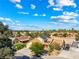 Beautiful aerial view showcases a well-maintained home with a tile roof and solar panels at 3930 Maranatha Cir, Las Vegas, NV 89103