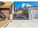 Backyard showing a gated area leading to a possible pool or recreational space at 3930 Maranatha Cir, Las Vegas, NV 89103
