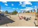 Large backyard featuring palm trees and ample space for outdoor activities at 3930 Maranatha Cir, Las Vegas, NV 89103