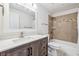 Bathroom features a tub/shower combo and a single sink vanity at 3930 Maranatha Cir, Las Vegas, NV 89103