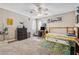 Cozy bedroom with ceiling fan, neutral walls, and carpeted floors at 3930 Maranatha Cir, Las Vegas, NV 89103