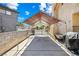 Outdoor patio with a covered area and string lights provides ample space for entertaining at 3930 Maranatha Cir, Las Vegas, NV 89103