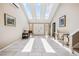 Bright and airy foyer with skylights and white tile flooring at 3930 Maranatha Cir, Las Vegas, NV 89103