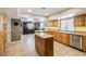 Charming kitchen featuring granite countertops, an island, and stainless steel appliances at 3930 Maranatha Cir, Las Vegas, NV 89103