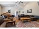 Spacious living room with high ceilings, hardwood floors, and a grand piano at 3930 Maranatha Cir, Las Vegas, NV 89103
