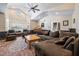 Open-concept living room featuring a vaulted ceiling and plenty of natural light at 3930 Maranatha Cir, Las Vegas, NV 89103