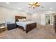 Main bedroom featuring carpet, vaulted ceiling, and makeup vanity at 3930 Maranatha Cir, Las Vegas, NV 89103