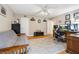 Comfortable office with a futon, ceiling fan and built in desk space at 3930 Maranatha Cir, Las Vegas, NV 89103