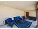 Covered patio with outdoor seating, rug, and door with access to the home at 3930 Maranatha Cir, Las Vegas, NV 89103
